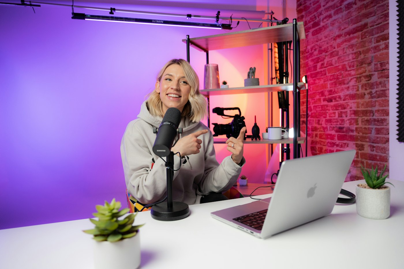 Creator recording a video in a home studio
